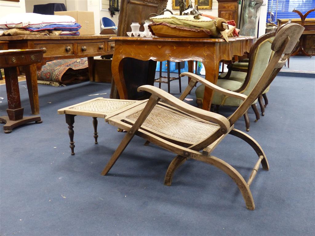 An Anglo Indian caned bleached hardwood steamer chair
